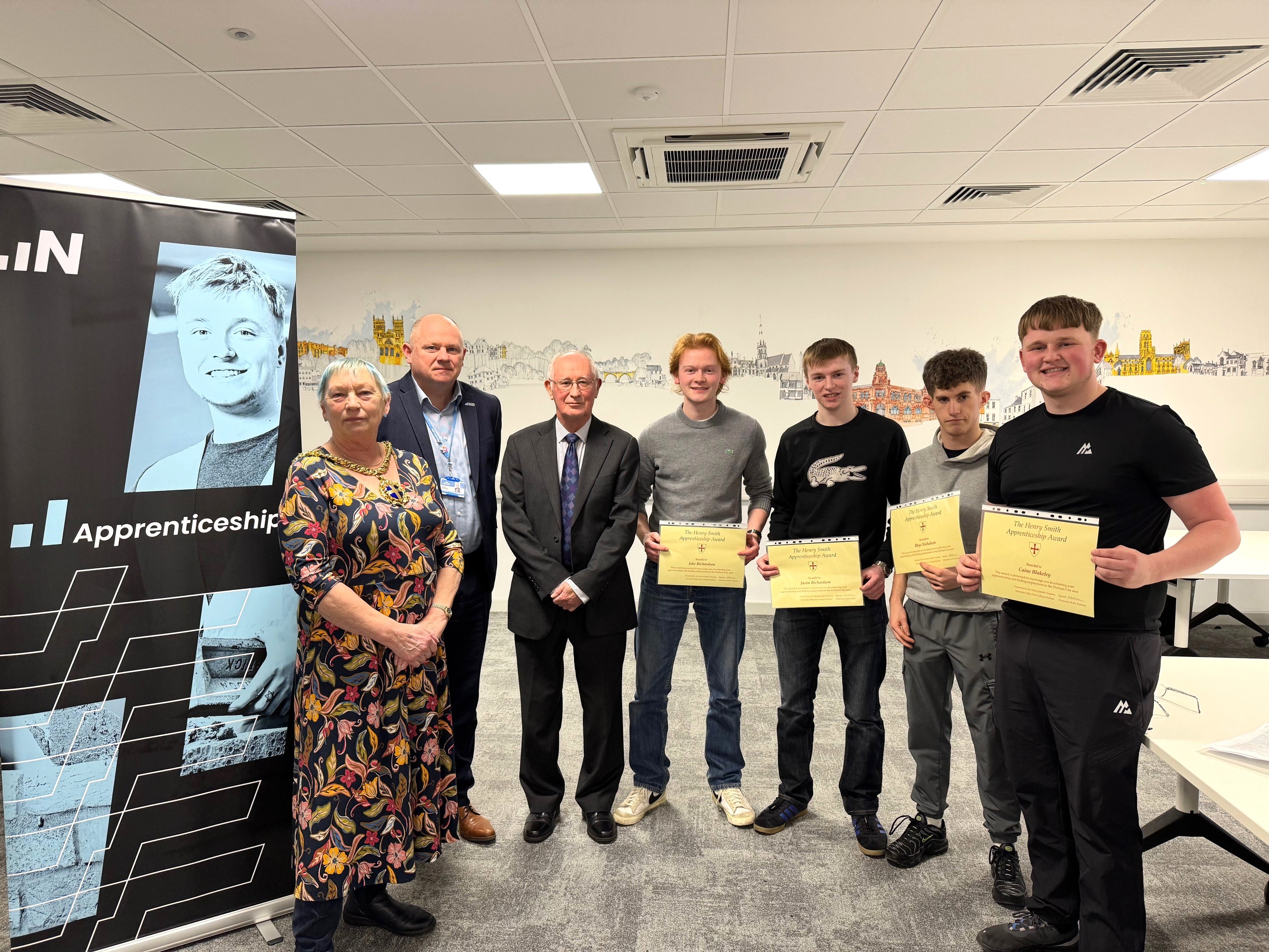 Photo Caption L-R, Cllr. Liz Brown, Mayor of Durham, Andy Broadbent, Principal and Chief Executive New College Durham, Ian Mackenzie, Chair of Trustees, The Henry Smith Charity, and several of the successful apprentices.